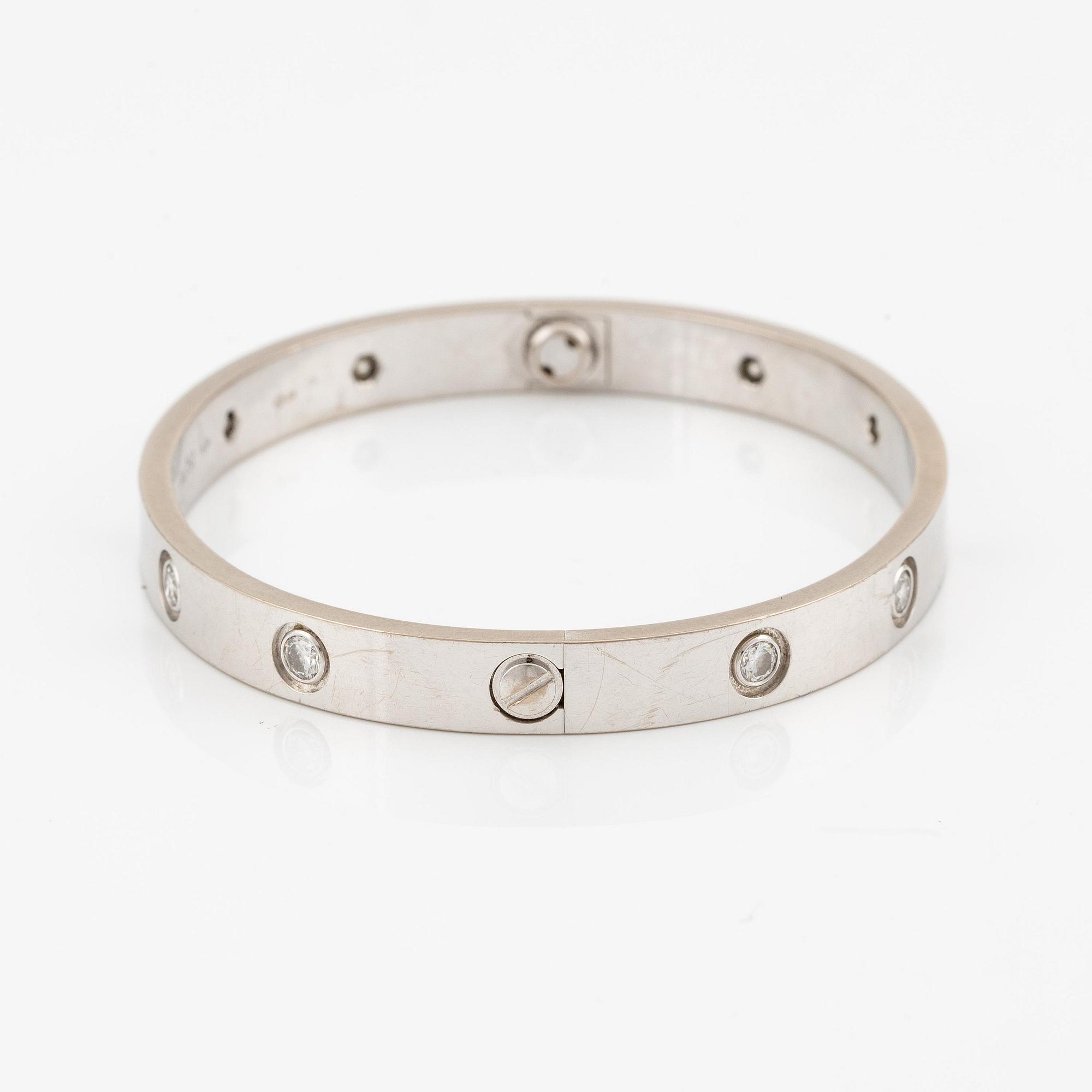 Cartier armband " Love" 18K vitguld med tio runda briljantslipade diamanter.