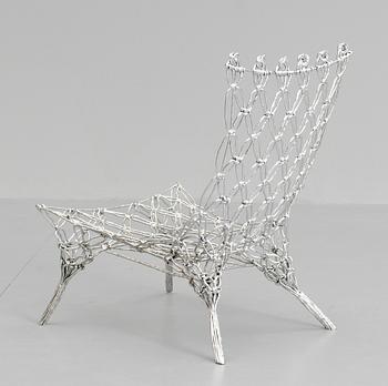 A Marcel Wanders 'Knotted Chair' made of macramé knotted carbon and aramide fiber cord by Cappellini, Italy.
