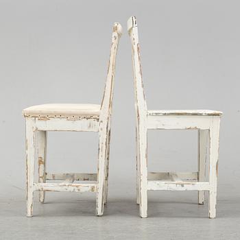 A set of eight painted chairs from the 19th Century.