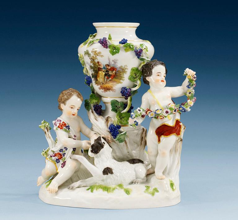 A Meissen figure group with a vase, 19th Century.