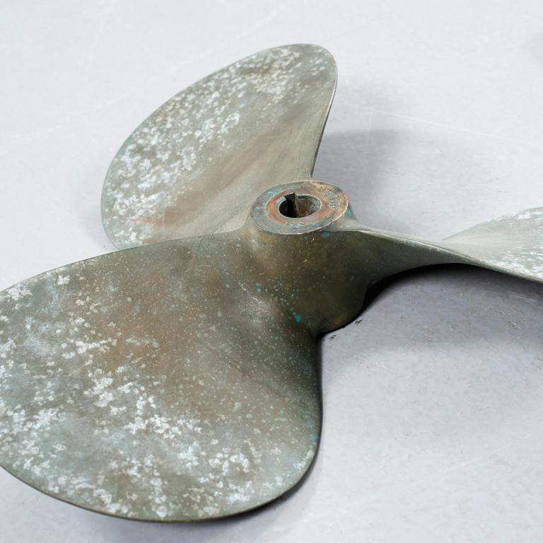 Four 20th century bronze propellers.