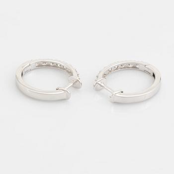 Brilliant cut diamond hoop earrings.
