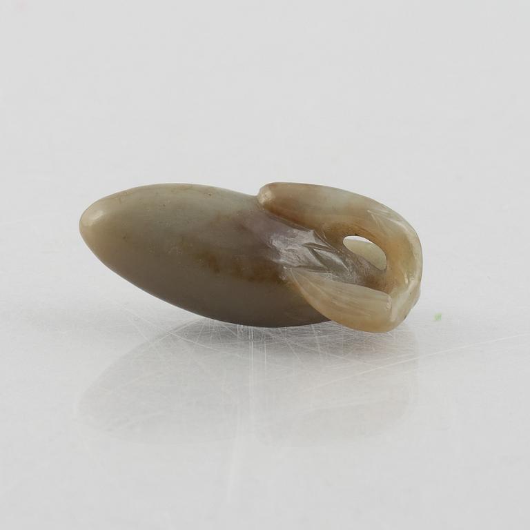 A group of three Chinese stone charms, 20th century.