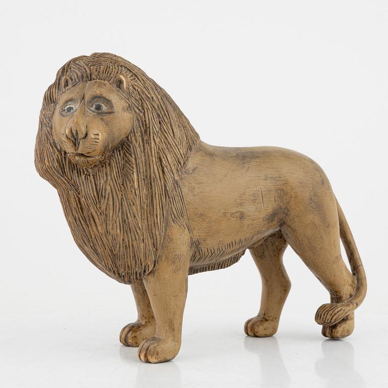 Two wooden lions, 19th and 20th Century.