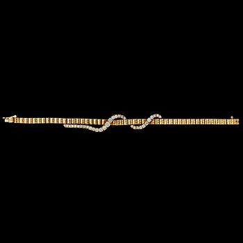 1283. ARMBAND, guld med briljantslipade diamanter, tot. ca 1.70 ct.