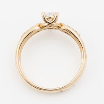 Ring 14K guld med droppslipad diamant, medföljande IGI report.