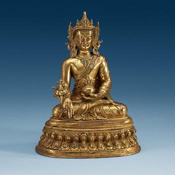 1528. A seated gilt bronze figure of Amitayus, presumably late Qing dynasty/20th Century.