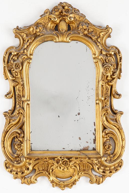 A late 19th century rococo style mirror.