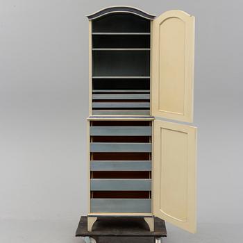 a Carl Malmsten "Island" cabinet.