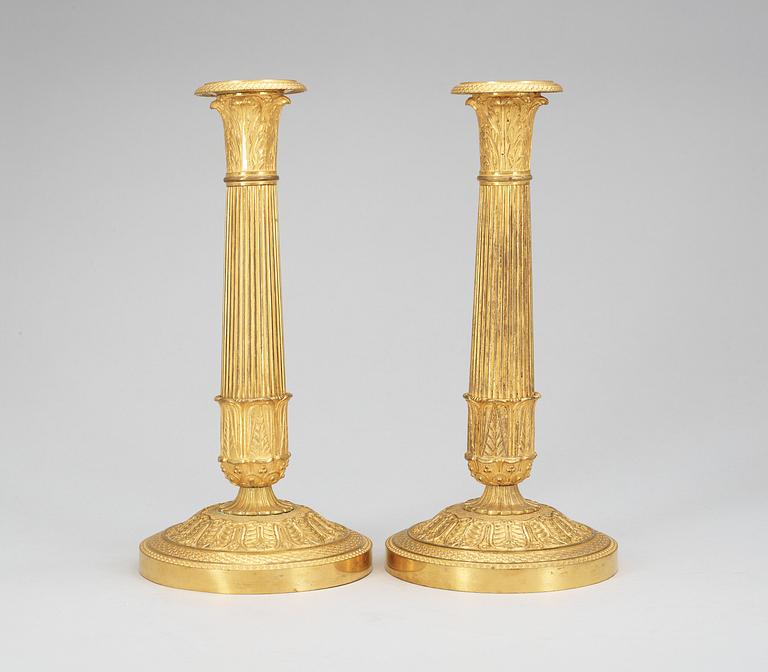 A pair of French Empire early 19th Century candlesticks.