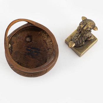 A Chinese bronze seal stamp and a tripod censer, late Qing dynasty, 19th century.