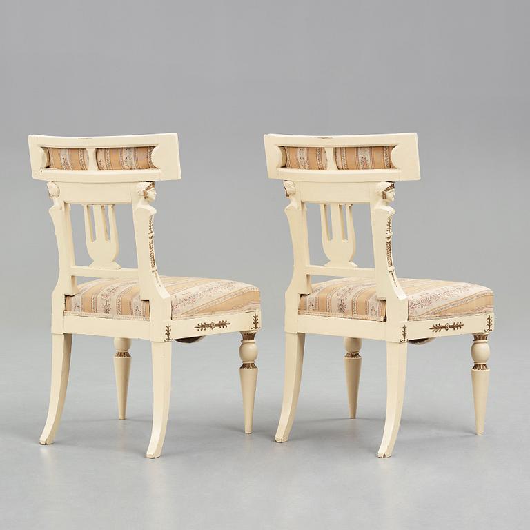 A pair of late Gustavian early 19th century chairs in the manner of Carl Christoffer Gjörwell (1766-1837).