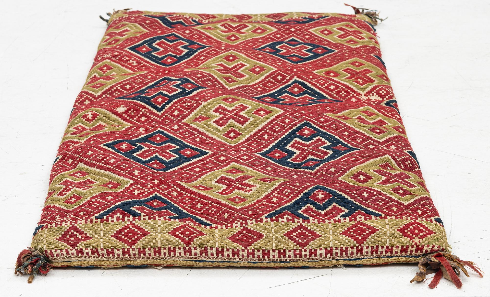 Sled cushion, approx. 98 x 48 cm.