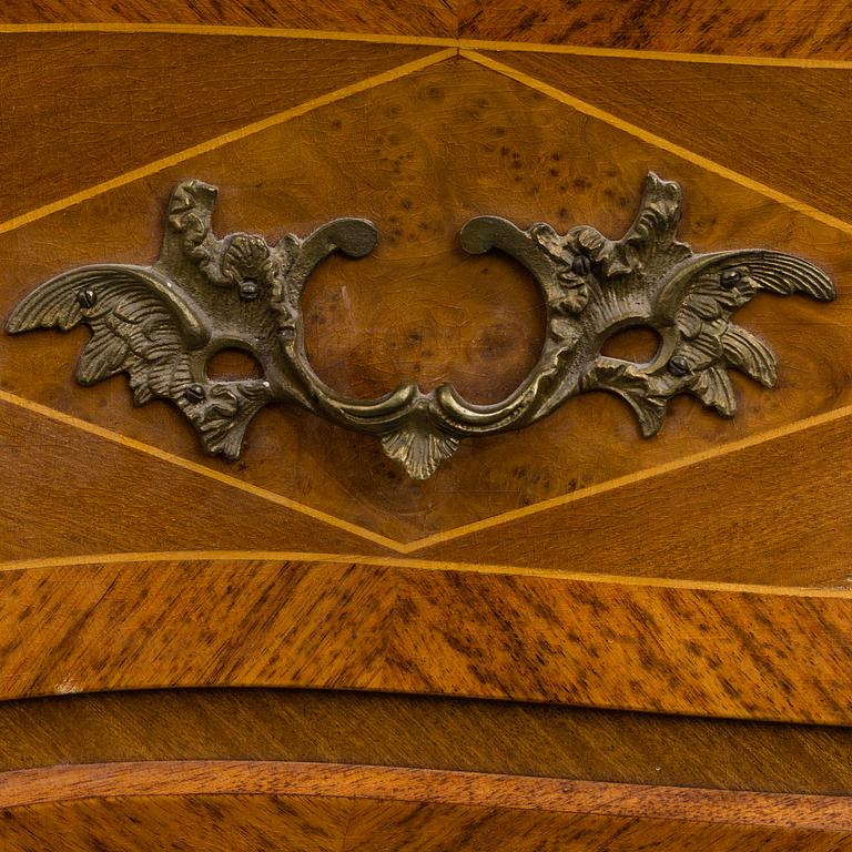 A Swedish rococo-style chest of drawers. Mid 20th century.