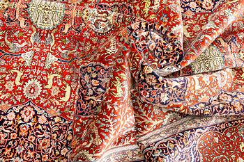 A pictoral orietal silk rug, 246 x 153 cm.