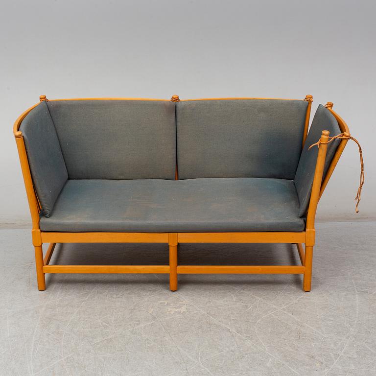 A "Tremme" sofa and armchair, designed by Børge Mogensen, Fritz Hansen, second half of the 20th century.