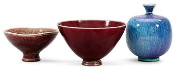 1164. A Berndt Friberg stoneware vase and two bowls by Gustavsberg Studio.