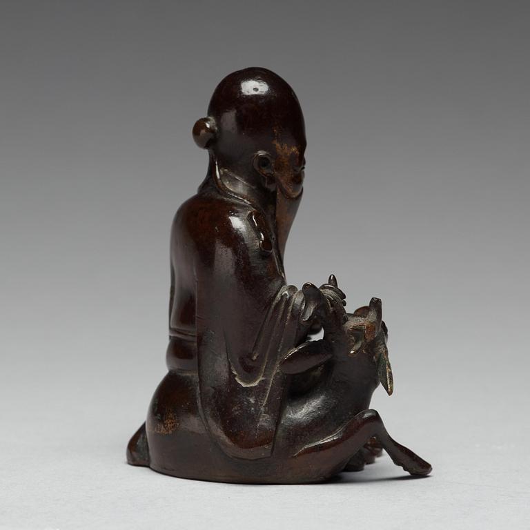 A bronze figure of Laozi with his deer, Qing dynasty, 18th Century.