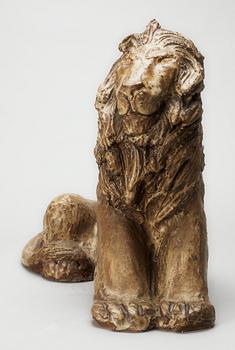 A Michael Schilkin stoneware sculpture of a lion, Arabia, Finland, 1940's.