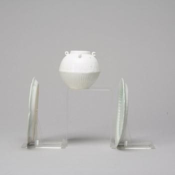 Two celadon glazed dishes and a white glazed jar, South East Asia, presumably 12th/17th Century.