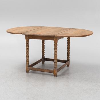 A pine gate-leg table, 18th/19th Century.