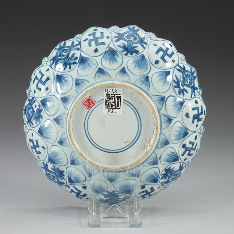 A moulded flower-shaped blue and white dish, Ming dynasty, 17th Century.
