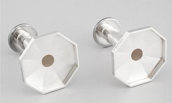 A pair of silver candelsticks by Bengt Liljedahl, STockholm, 1978.