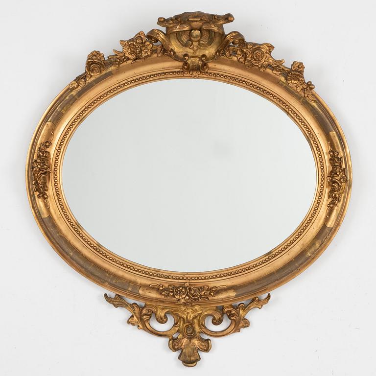 A Rococo Revival mirror, second half of the 19th century.