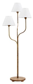 547. A brass floor-lamp attributed to G.A. Berg, Sweden 1940's.