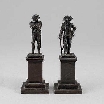 FIGURER, två stycken, gjutjärn, Empire, 1800-talets första hälft.