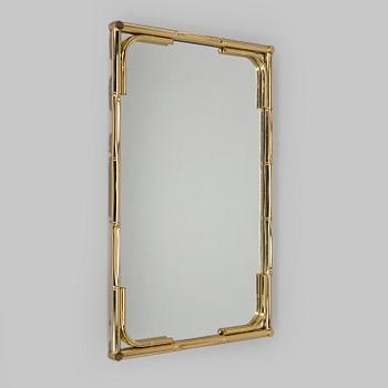 A 1970s/80s brass mirror.