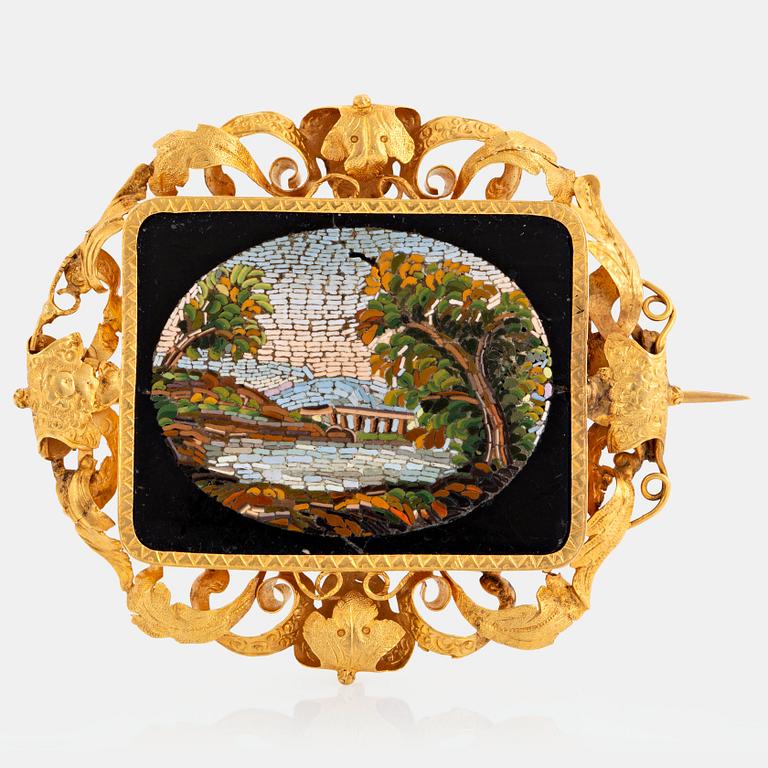 An 18K gold and micro mosaic brooch.