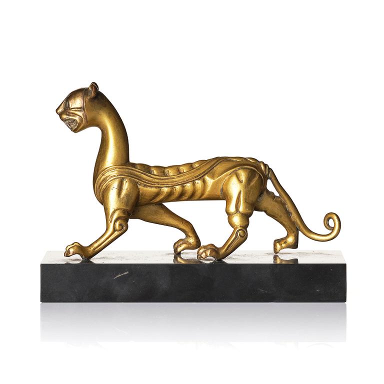 An elegant gilt bronze sculpture of a tiger, Six dynasties, or earlier.