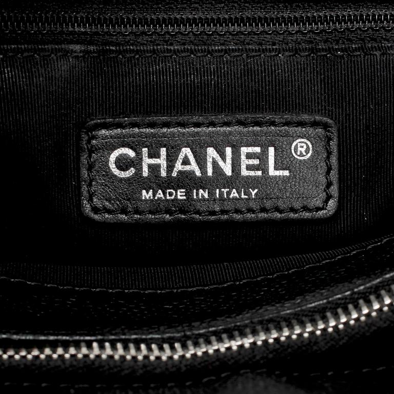 CHANEL, a black caviar leather purse, "Grand Shopping Tote".