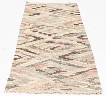 A Kilim runner, c. 290 x 80 cm.