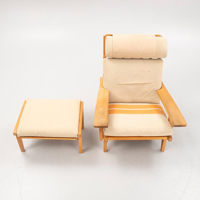 Hans J. Wegner, a "GE375", easy chair and a foot stool for Getama, Denmark, 1970's.