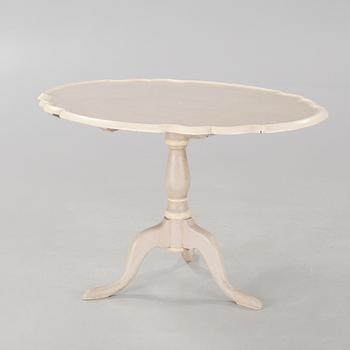 A late 19th century drop-leaf table.