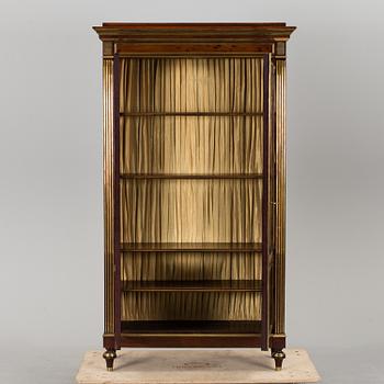A Russian mahogany veneered display cabinet from around year 1900.