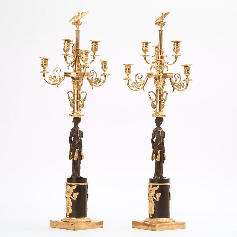 A pair of Empire early 19th century six-light candelabra.
