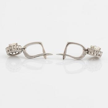 Cushion cut diamond earrings.