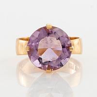 Ring 18K gold with a round faceted amethyst, Gustaf Fredrik Hallengren Malmö 1903.