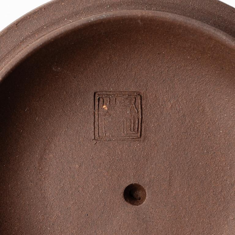 A group of Chinese yixing teapots, 1980s.