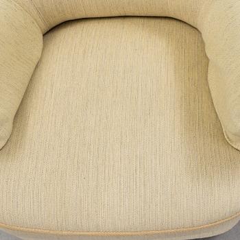 A pair of second half of the 20th century 'Hemmakväll' easy chairs by Carl Malmsten.
