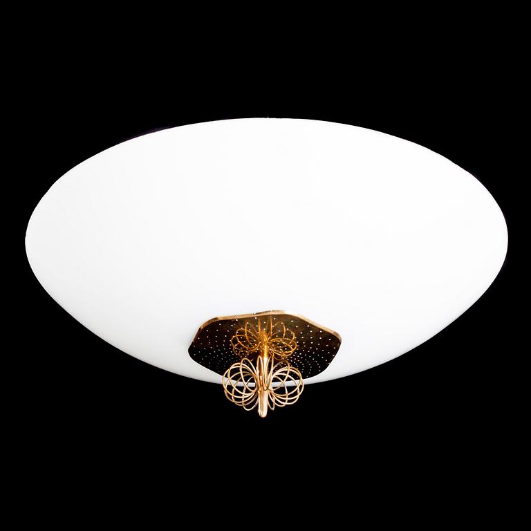 PAAVO TYNELL, kattovalaisin, Idman 1900-luvun puoliväli.