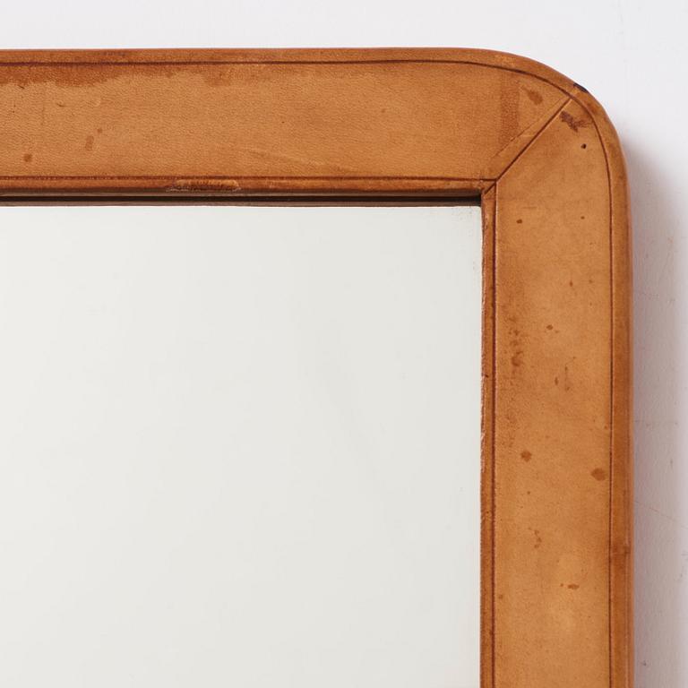 Gunnar Asplund, a leather framed mirror, Bredenberg's Department Store, Stockholm, built in 1934-35.