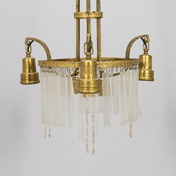 An Art Nouveau ceiling lamp, circa 1900.