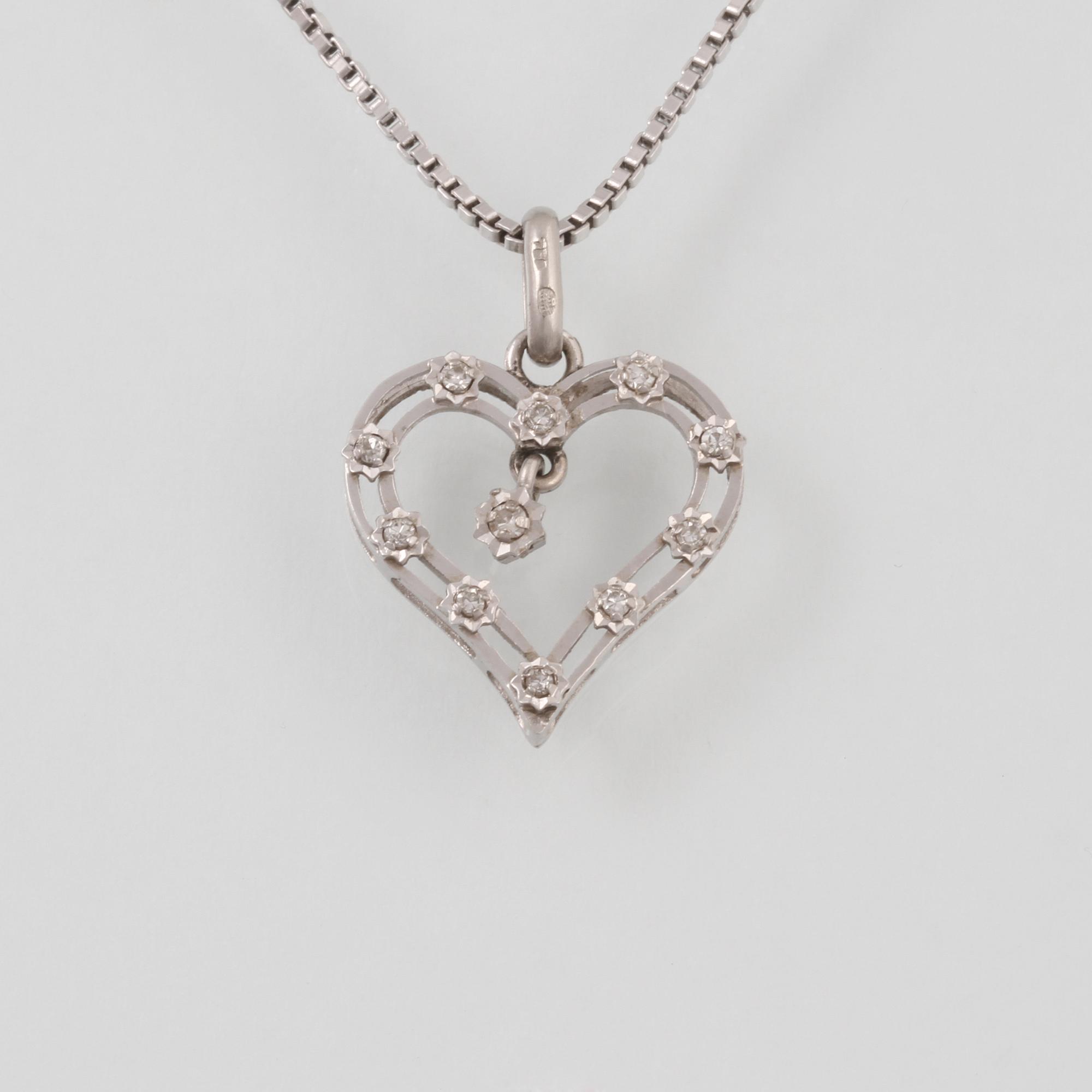 HÄNGE, 18K vitguld med åttkantslipade diamanter, importstämplat. Vikt 6,0 gram.