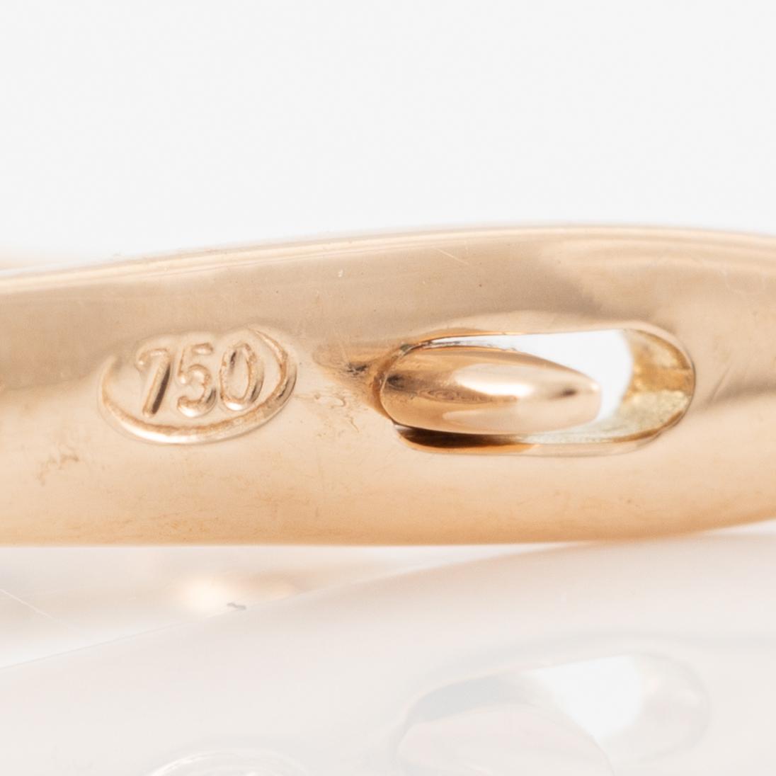 Ett par örhängen 18K guld med fasettslipade tanzaniter och runda briljantslipade diamanter.