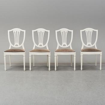 A dining table and four chairs, Gustavian style, second half of the 20th century. One leaf included.