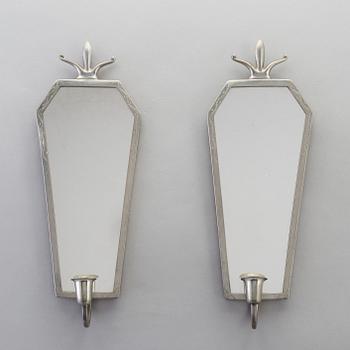 A Swedish mirror and a pair of wall sconces, 1920s / 30s.